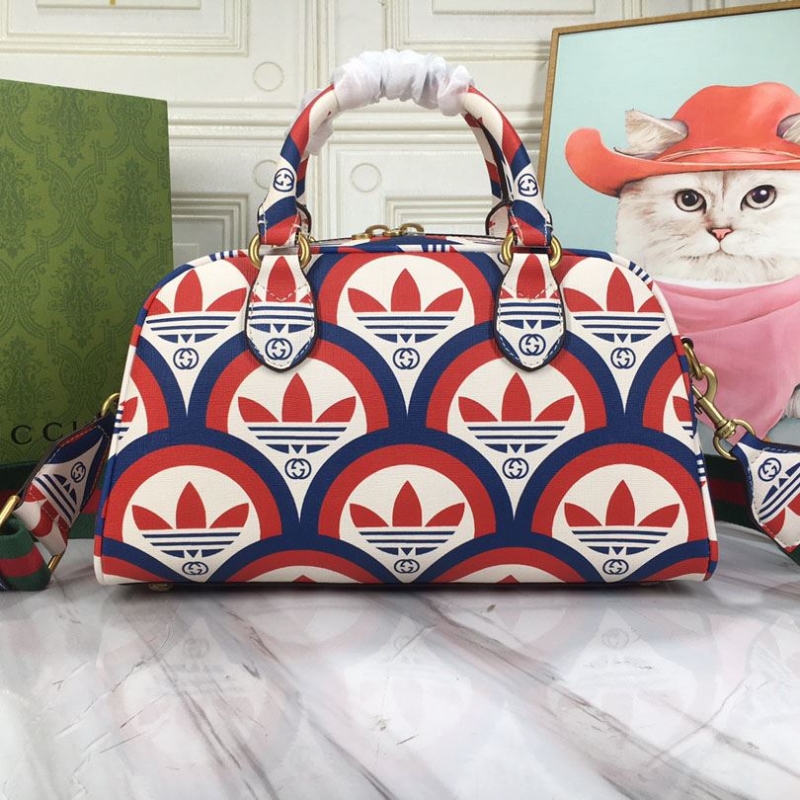 G*u*i top handle bags